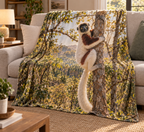White and reddish-brown sifaka clinging to a tree before receding dry forest printed on a softly draped fleece throw blanket
