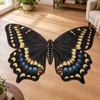 Black swallowtail wing artwork with yellow spots blue bands and orange eyespots printed on a flat butterfly-contour rug