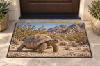 Desert tortoise with domed shell and sturdy scaled legs before receding rocky desert printed on a rectangular doormat