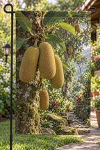 Ochre-yellow cempedak fruit and elliptic leaves before a deep orchard path printed on a complete hemmed flag
