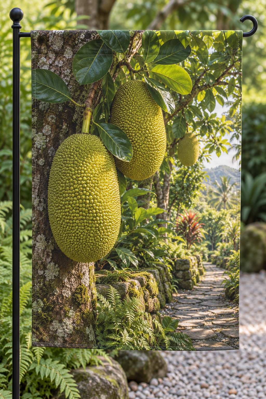 Green-yellow jackfruit and glossy leaves before a deep orchard path printed on a complete hemmed flag