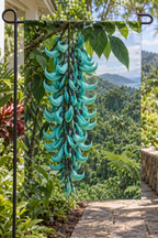Pendant turquoise jade-vine flowers with curved claw-like shapes and green foliage printed on a complete rectangular garden flag