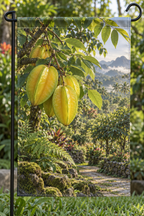 Golden ridged starfruit and green leaflets before a deep orchard path printed on a complete hemmed flag