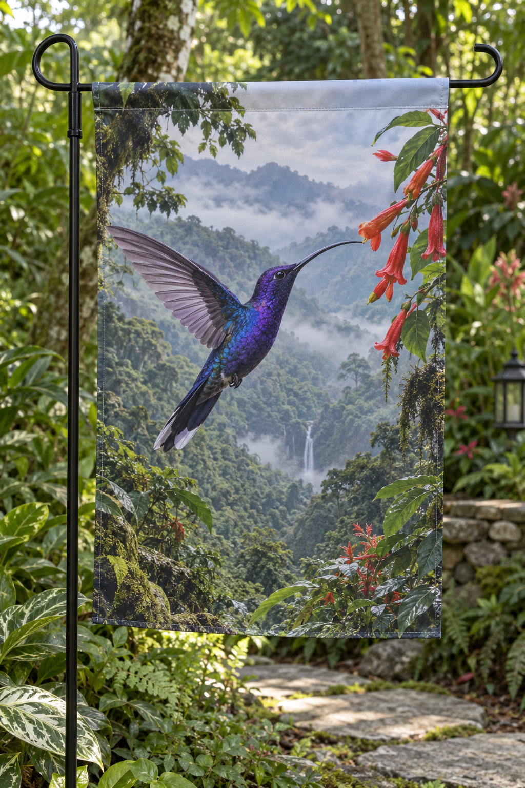 Violet sabrewing hovering beside red flowers above a misty forest printed on a complete garden flag