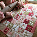 Rosy Hearth Story area rug in a living room