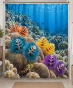 Colorful paired spiral Christmas tree worm crowns on coral and a receding blue reef printed on a polyester shower curtain