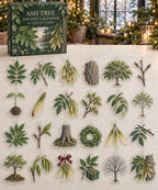 Ash Tree advent calendar with 24 custom-shaped flat acrylic charms and printed dimensional artwork