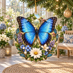 Blue morpho butterfly christmas ornament with layered wildflowers, blue-green leaf accents and a matching sunroom setting