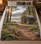 Cabin tent lakeside scene printed on a flat fleece throw blanket.
