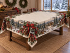 Christmas Pine Cone Woodland Tablecloth displayed in woodland wreath-maker dining nook with pinecone basket, ribbon spool, unfinished wreaths and conifer view