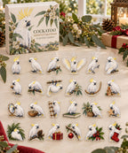 Cockatoo advent calendar with 24 custom-shaped flat acrylic charms and printed dimensional artwork