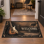 Complete rectangular doormat with readable WELCOME, a cropped guitar in the printed composition, amplifier and black-gold border.
