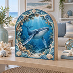 Complete arched three-panel tabletop block with two side joins, continuous humpback print and wave-shell frame.