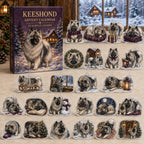 Keeshond advent calendar box and 24 illustrated acrylic charms displayed on an ivory tabletop in a winter setting