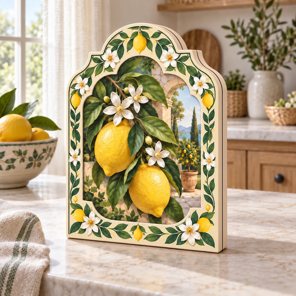 Wooden block with printed lemons, white blossoms and green garden-tile framing in a bright kitchen
