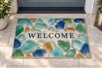 Sea Glass Shapes Welcome Mat with dimensional printed themed artwork; representative AI-generated mockup.