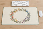 Rainbow Garden Celebration Wreath Desk Mat with dimensional printed themed artwork; representative AI-generated mockup.