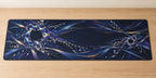 Nocturne Orrery Desk Mat with dimensional printed themed artwork; representative AI-generated mockup.
