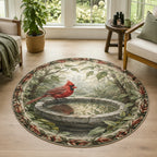 Northern cardinal perched at a stone birdbath with matching botanical border on round mat rug