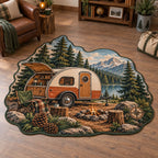 Full irregular green outline; coherent trailer and galley, campfire, chairs and pinecone foreground.