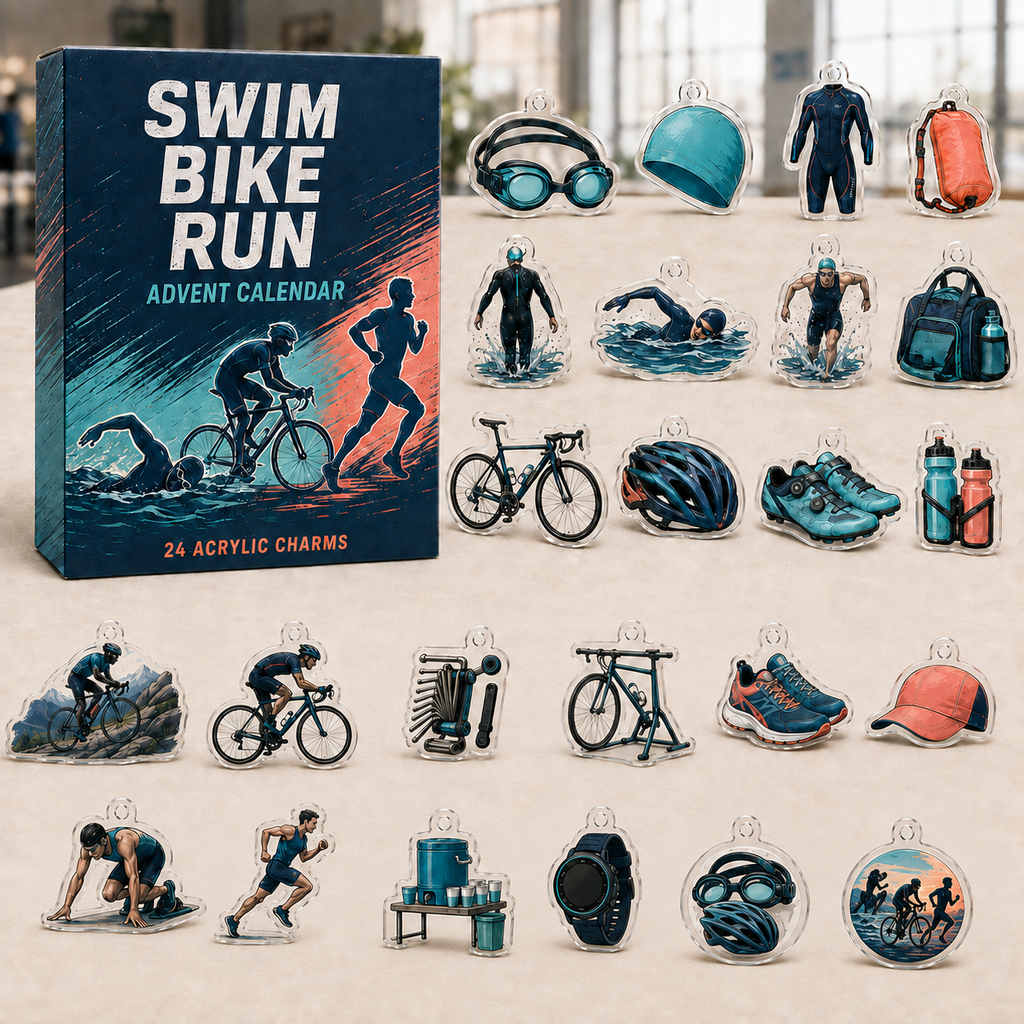 Triathlon Swim Bike Run advent calendar gift box with 24 illustrated acrylic charms arranged on a light tabletop